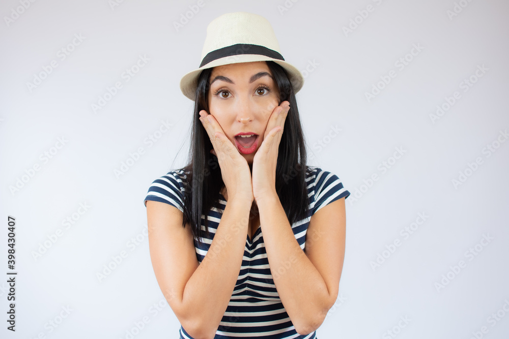 Close up portrait of young beautiful woman wearing straw hat surprised over white background. Close up portrait of young beautiful woman wearing straw hat surprised over white background.
