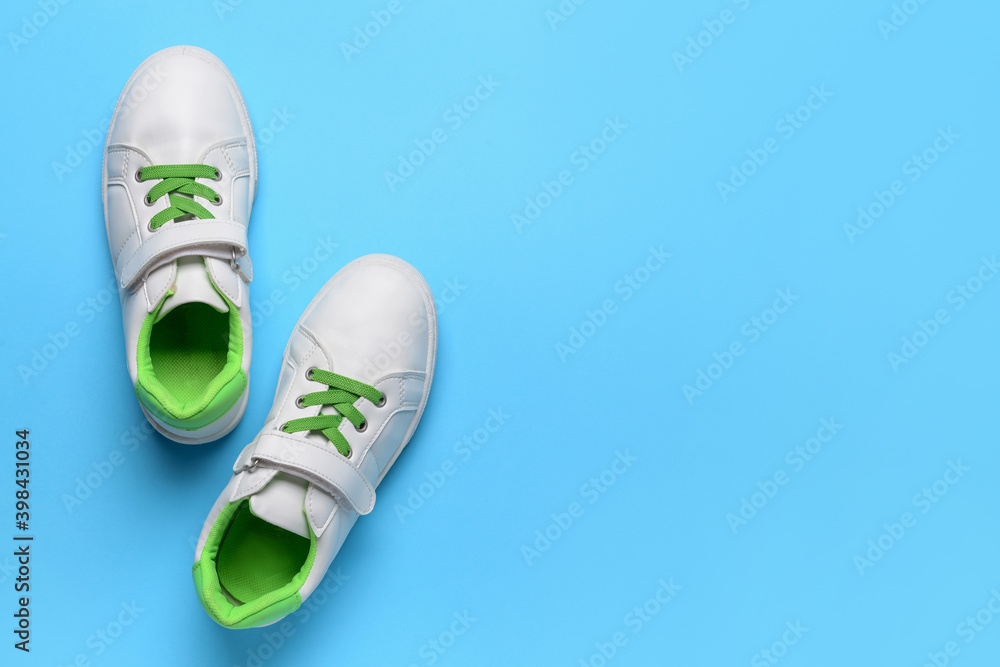 Child's shoes on color background Child's shoes on color background