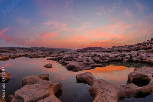 Grand Canyon sunset with reflections on the water surface