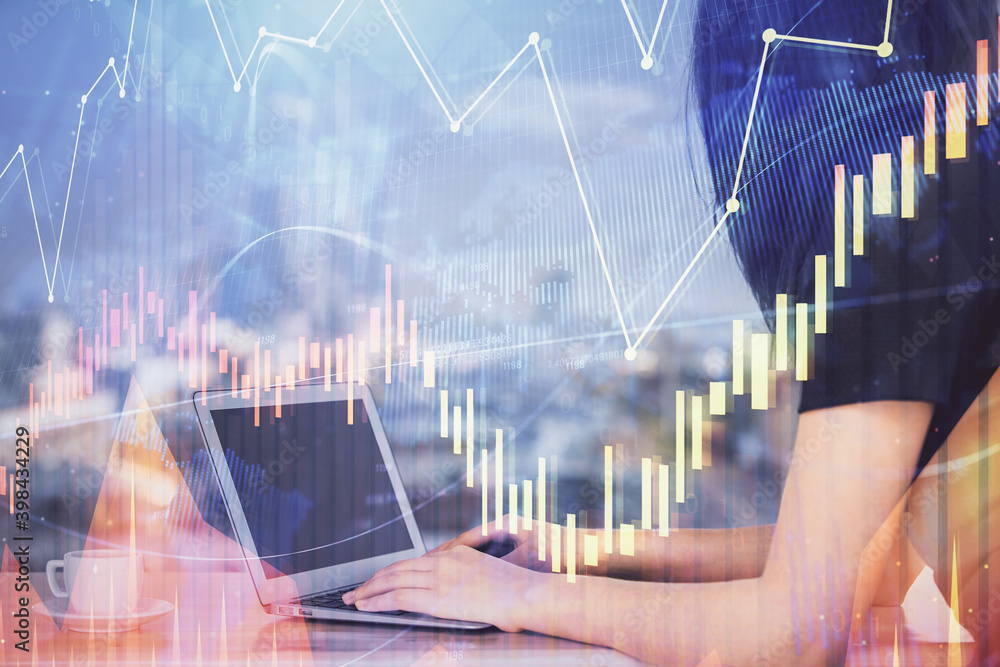 Double exposure of businesswoman hands typing on computer and forex chart hologram drawing. Financial analysis concept. Double exposure of businesswoman hands typing on computer and forex chart hologram drawing. Financial analysis concept.