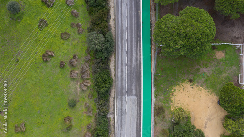 Top view of a car road next to a bicycle pathway in south Spain, Cadiz © Pablo