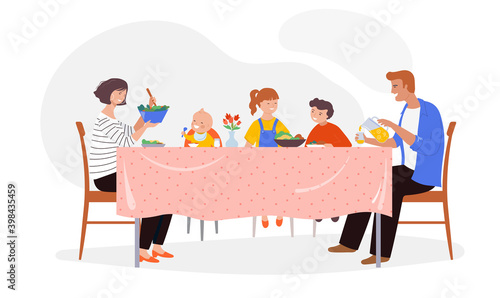 Festive dinner family scene. Children, parents and grandparents sitting at a dinner table, eating together. 