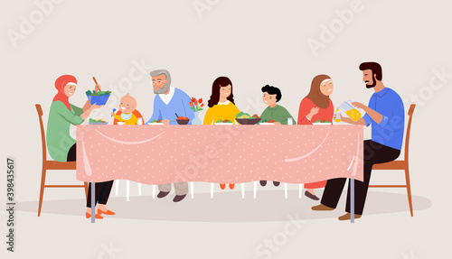 Festive dinner family scene. Children, parents and grandparents sitting at a dinner table, eating together. 