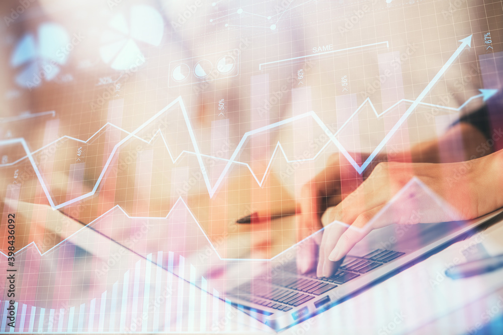 Double exposure of woman hands typing on computer and forex chart hologram drawing. Stock market invest concept. Double exposure of woman hands typing on computer and forex chart hologram drawing. Stock market invest concept.