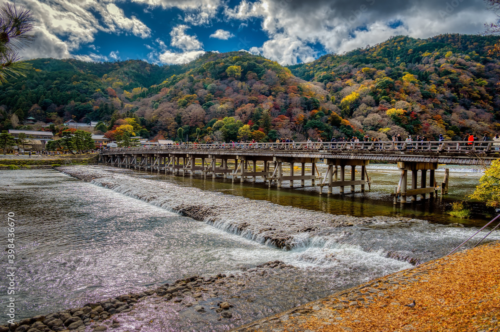 Fototapeta premium Katsura river in Arashiyama, Kyoto, Japan, in autumn