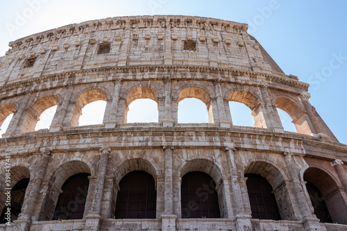 Roman colosseum up close. An ancient arched structure.