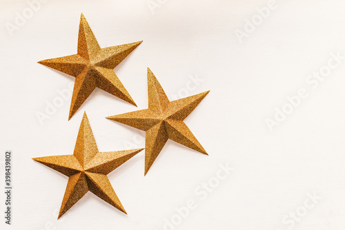 Golden stars on white
