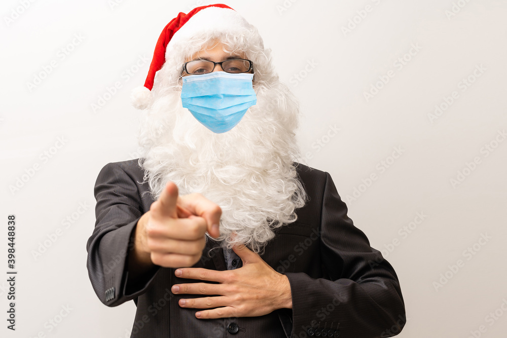 Hello kids. Closeup photo old bearded happy santa talk children remote internet online facial webcam view work wear respirator mask headwear shirt suspenders isolated red background Hello kids. Closeup photo old bearded happy santa talk children remote internet online facial webcam view work wear respirator mask headwear shirt suspenders isolated red background