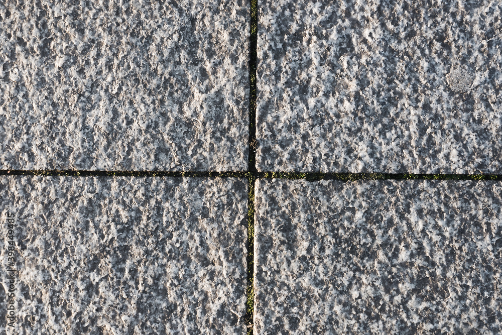 Pavement blocks top view. Mineral grain texture. Distressed noise pattern. Marble background. Flat granite surface. Macro effect structure for graphic design. Divide by four geometric block. Pavement blocks top view. Mineral grain texture. Distressed noise pattern. Marble background. Flat granite surface. Macro effect structure for graphic design. Divide by four geometric block.