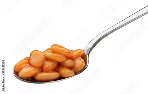 Spoon of baked beans in tomato sauce isolated on white background photo