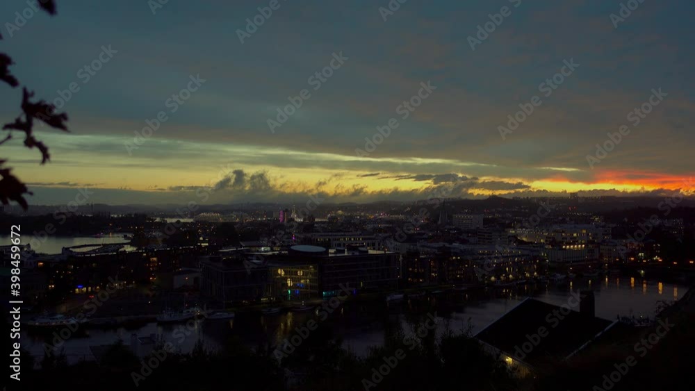Town at sunset from an elevated panorama viewpoint Town at sunset from an elevated panorama viewpoint