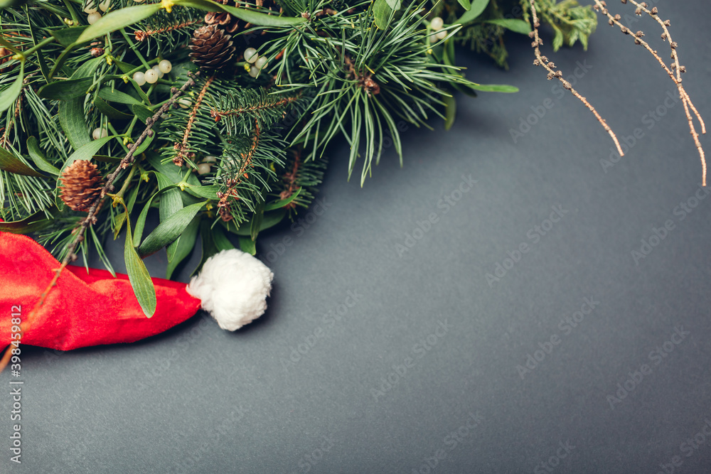 Ταπετσαρία Santa's hat put by fir, pine, mistletoe branches with cones