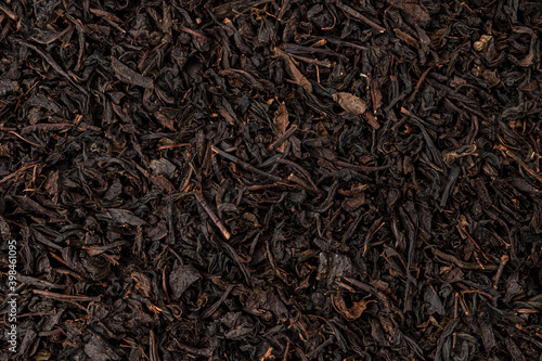 Dry tea leaves background or texture, black tea pattern