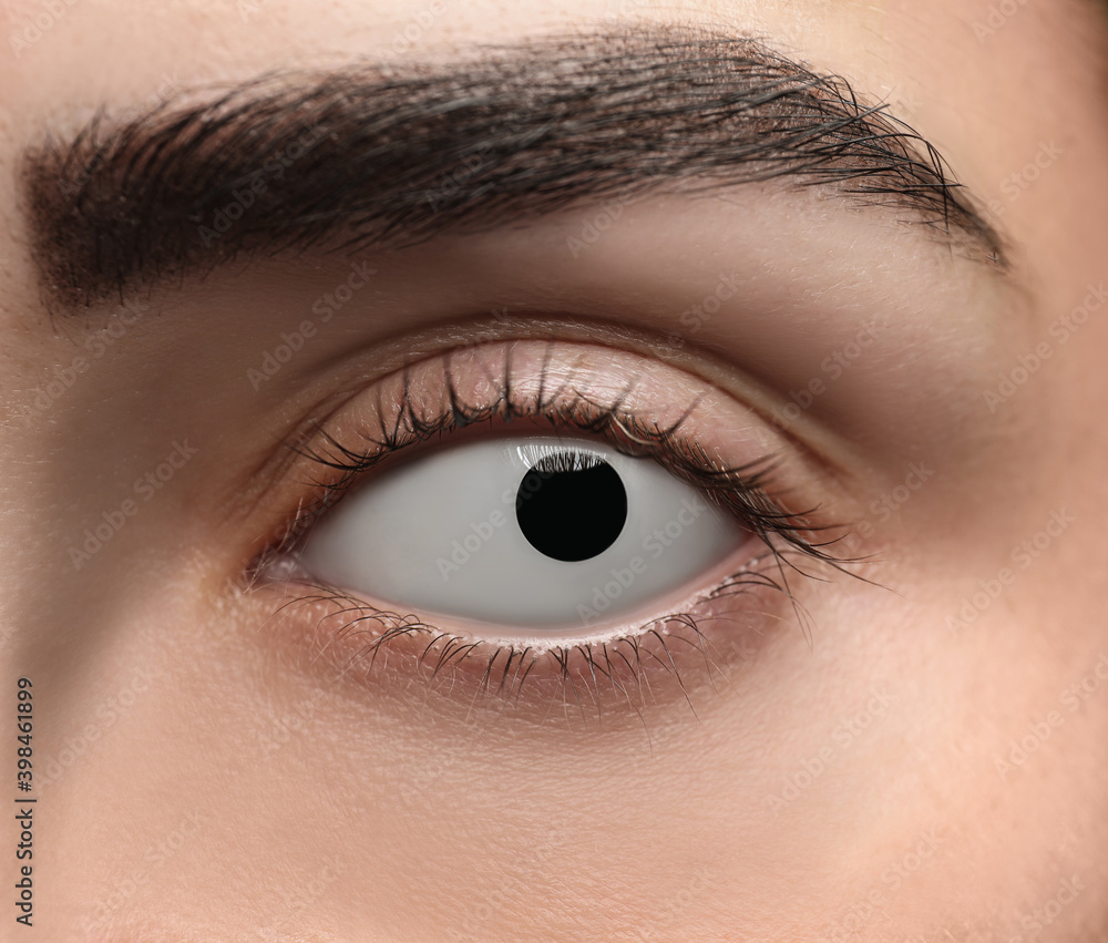 Obraz premium Mysterious witch with spooky eyes, closeup. Halloween party