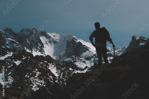After many hours of hiking, hikers reach the snow-covered peaks of Europe in Asturias, Spain © Gigo Velasco Tablado