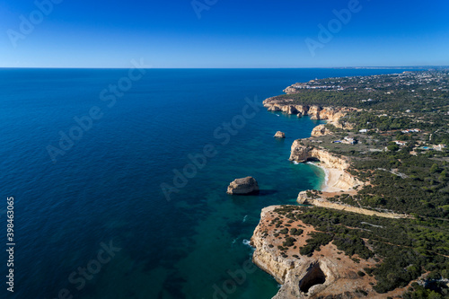 Aerial view of the beautiful coastline near Lagoa, in Algarve, Portugal. © Tiago Fernandez