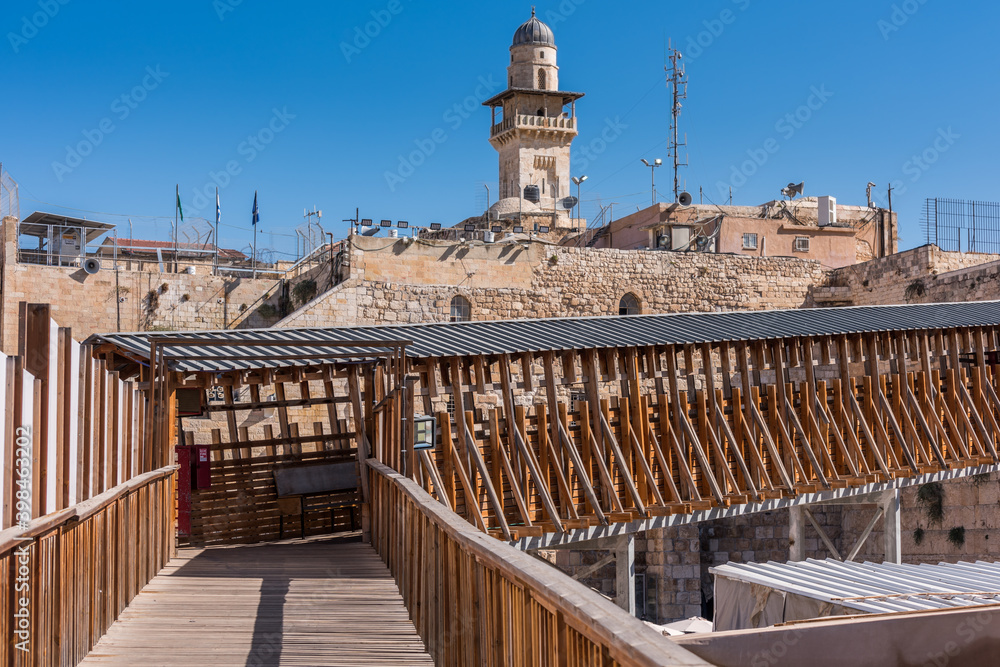  Bab al-Silsila minaret and Wooden Mughrabi Bridge, a wood bridge connecting the Western Wall area with the Mughrabi Gate of the Temple Mount in Jerusalem, Israel