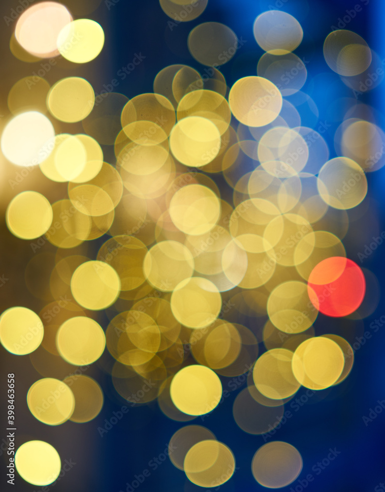 Bokeh balls from christmas lights in the evening out on the streets Bokeh balls from christmas lights in the evening out on the streets