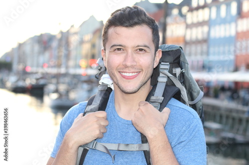 Canvas Print Ethnic backpacker walking around Denmark