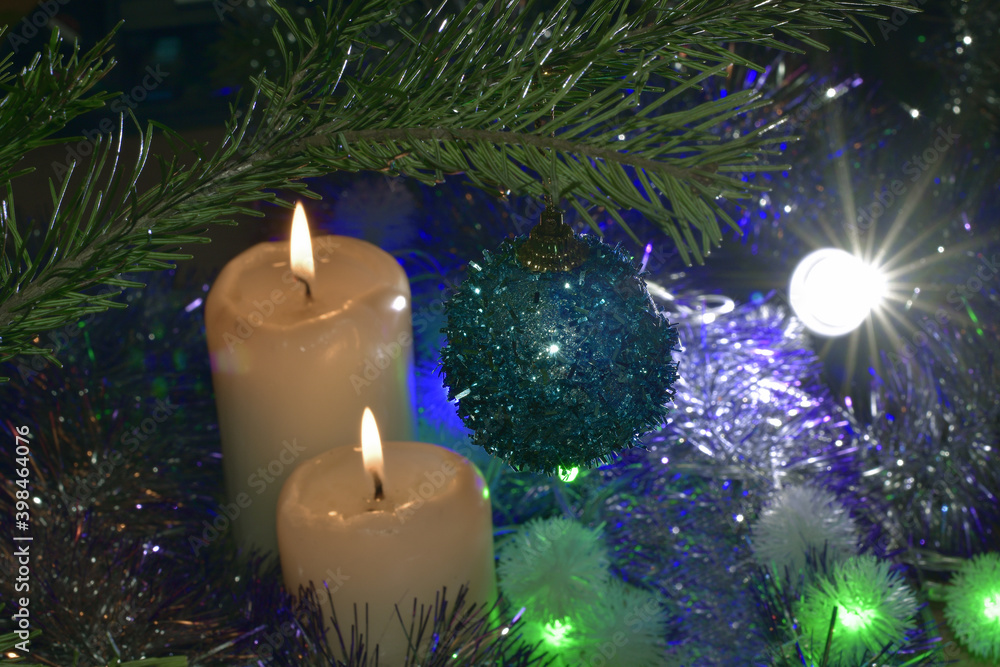 Candles are burning by the Christmas tree. Happy Holidays! Candles are burning by the Christmas tree. Happy Holidays!