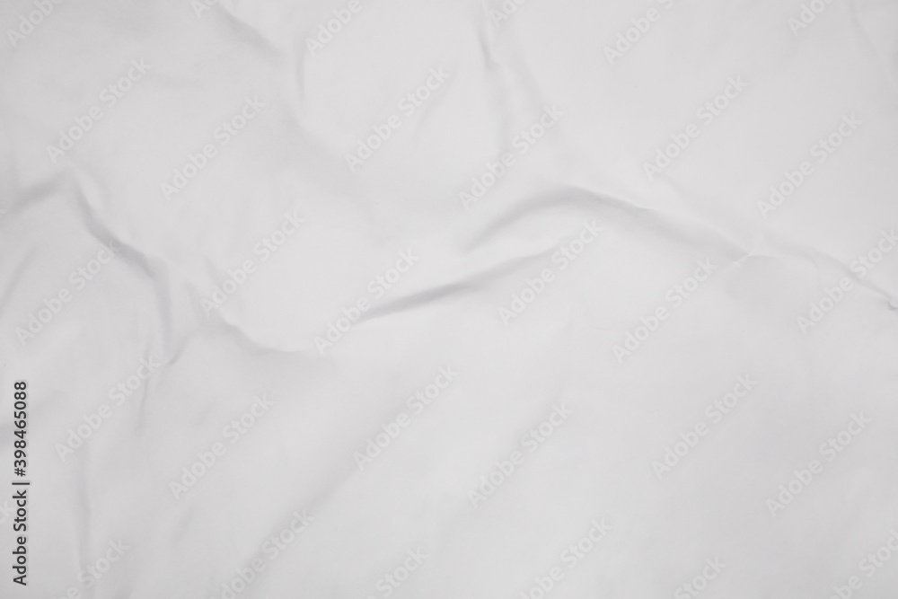 Obraz premium Top view of white creased blank poster as background, closeup