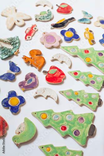 Ceramic Christmas Tree decorations on the market - green tree, animal, angel, heart, moon and flower.