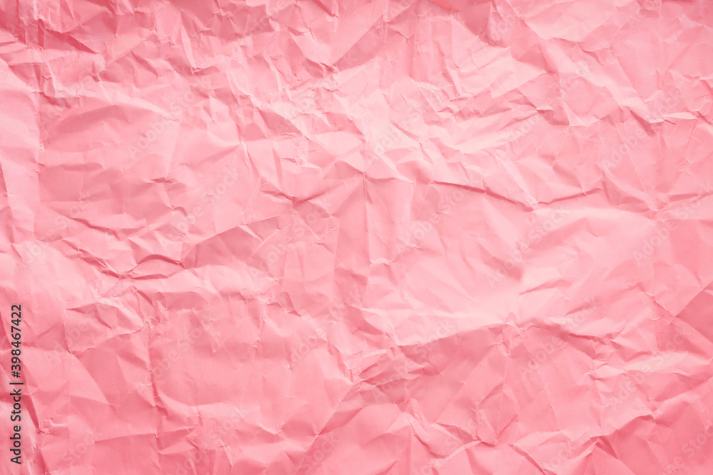 Crumpled pink paper. Copy space.