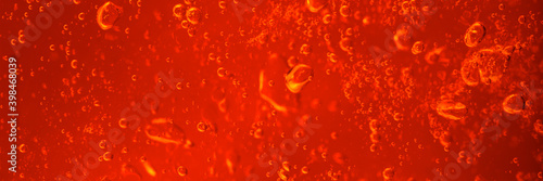 Air bubbles in red jelly photo