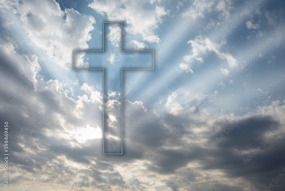 Christian cross in the sky with clouds