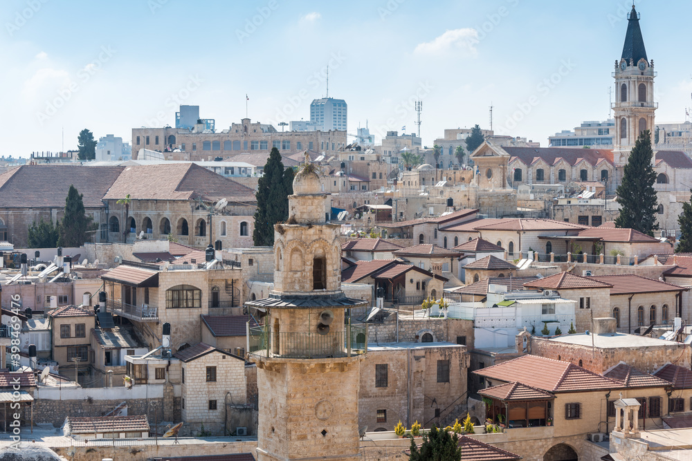 Aerial view of rooftops of buildings of Muristan area in the old city of Jerusalem. Minaret of Mosque of Omar View from the Lutheran Church of the Redeemer.