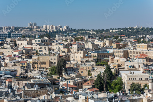 Aerial view of rooftops of buildings in the old city with blue sky of Jerusalem. View from the Lutheran Church of the Redeemer. © zz3701