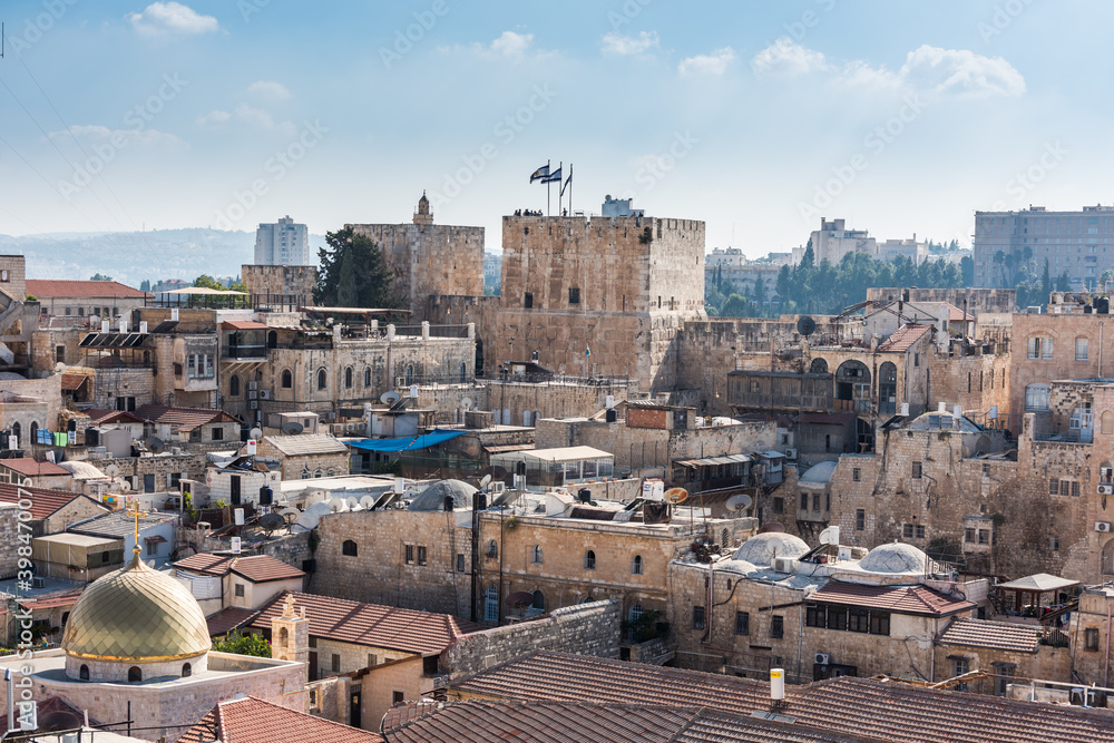 Fototapeta premium Aerial view of the old city of Jerusalem with The Tower of David in ancient Jerusalem Citadel, View from the Lutheran Church of the Redeemer.