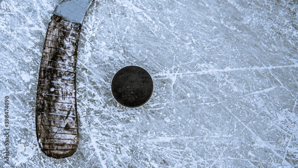 Fototapeta premium close-up of sticks and pucks in the stadium