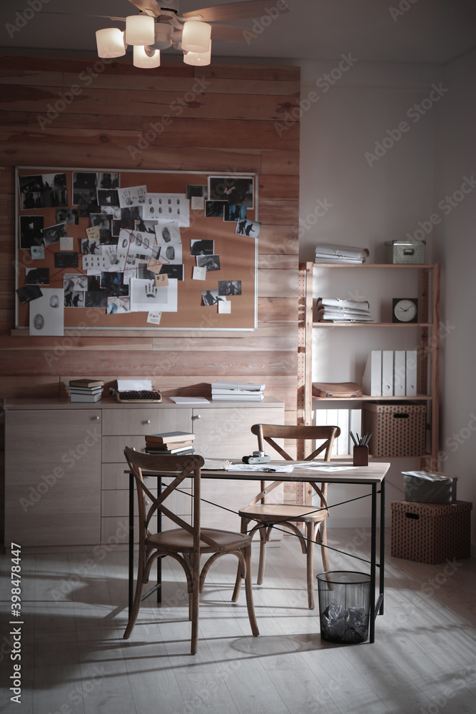 Detective office interior with evidence board on wall Detective office interior with evidence board on wall