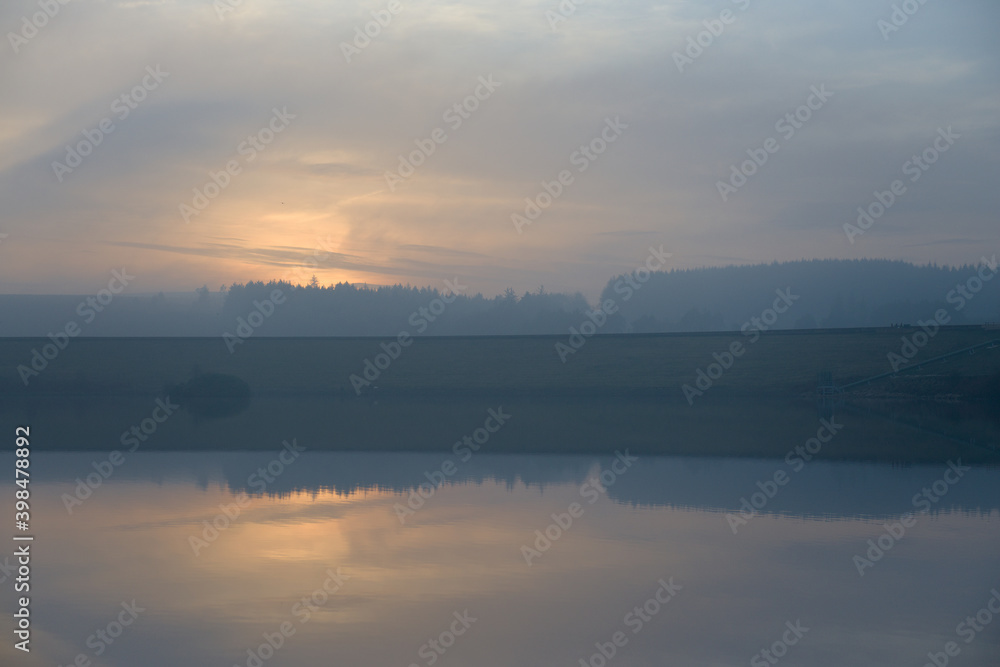 Washed out water based landscape image. Dusk over redmires reservoirs