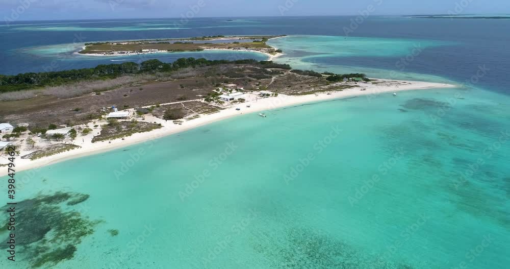 Aerial view, forward descending movement. madrisqui island. Los roques Venezuela Aerial view, forward descending movement. madrisqui island. Los roques Venezuela