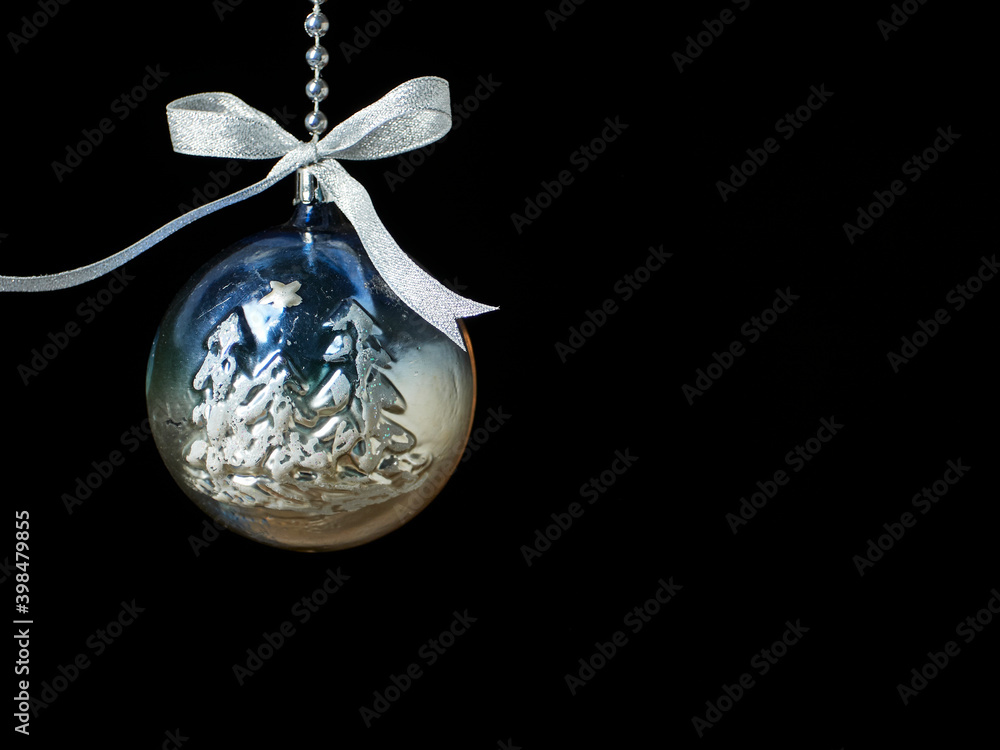 Fotografie Christmas ball hanging on dark background