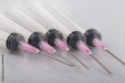 Syringe closeup isolated on a white background. photo