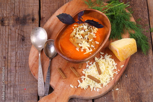 Cheese puree soup with croutons photo