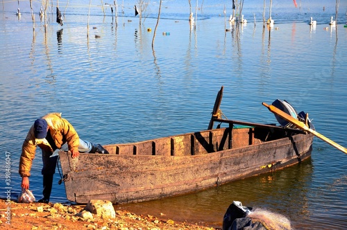 Fishing boat on Kerkini lake, an artificial reservoir located in Northern Greece, about 20km from Greek-Bulgarian border. photo