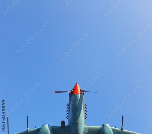 Airplane propeller against blue sky