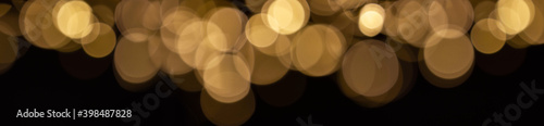 Abstract lights bokeh banner, luminous and dark background, lights effect with warm tone background photo