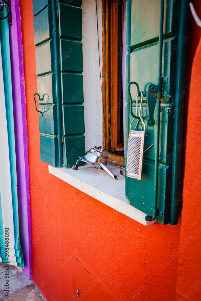 Colourful houses in the village of Burano, small island in the bay of Venice, Italy