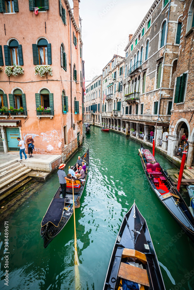 Traditional gondolas in the channels of Venice, Venetian, Italy