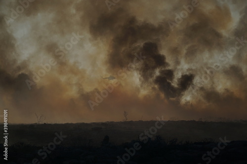 2019 - ELAFONISOS ISLAND, GREECE. Wildfires in Elafonisos island during the tourist season and in a NATURA protected area.