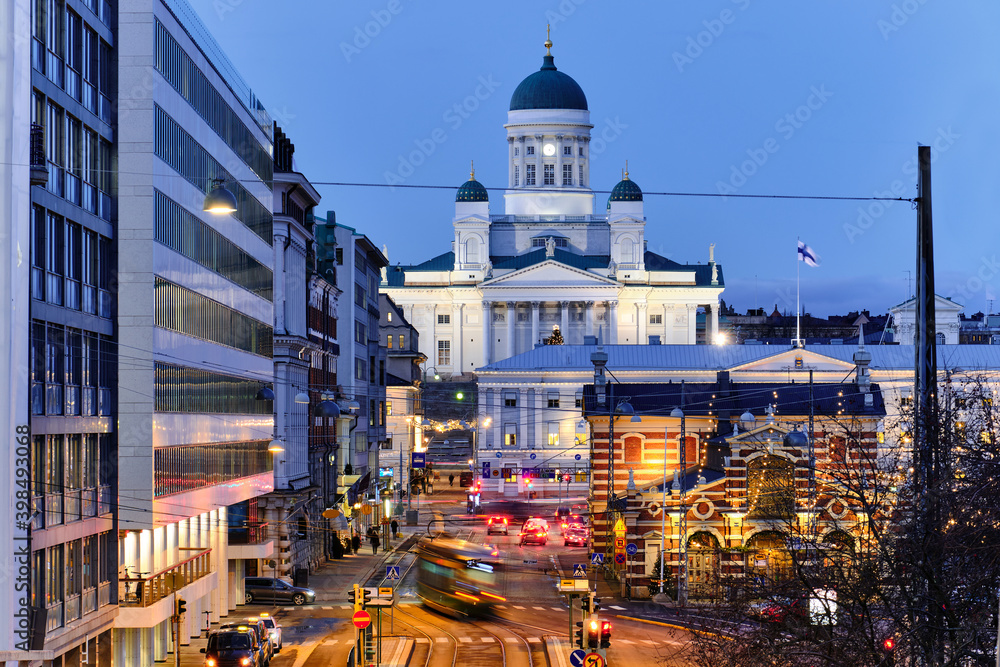 View of Helsinki Cathedral. The most famous landmark of Helsinki. The night cityscape. Streets decorated for Christmas.