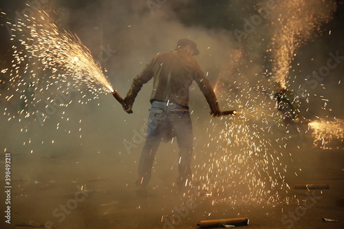 2018. KALAMATA, GREECE: The tradition of Saitopolemos in KAlamata, where men light homemade fireworks. The tradition was stopped when a cameraman lost his life after a firework hit his head in 2019.