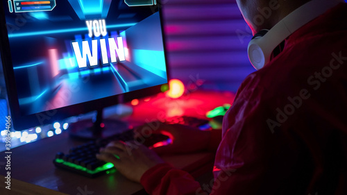 Obraz na plátně Professional Gamer Playing First-Person Shooter Online Video Game on His Powerful Personal Computer