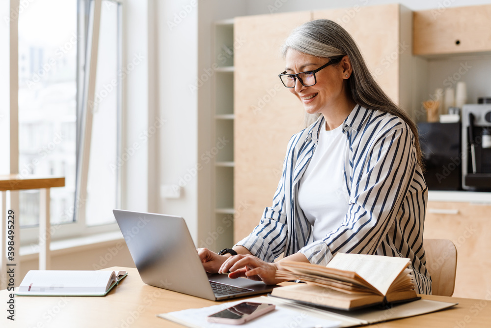 Attractive confident business woman working Attractive confident business woman working