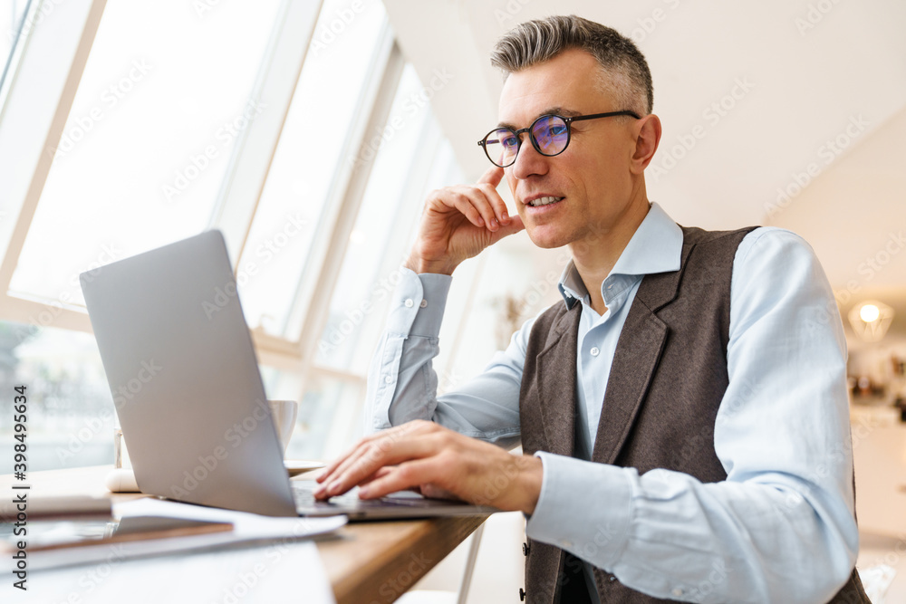 Confident handsome businessman in smart clothes Confident handsome businessman in smart clothes